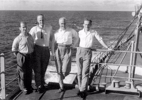 Commissioner Jackson and colleagues on the deck of the Empire Chieftain returning from their trip to London in 1945. Left to right: J Belcher, LS Jackson, R Mair, R Gray. Both Belcher and Mair became Second Commissioners and Gray became the Deputy Commissioner, Sydney.